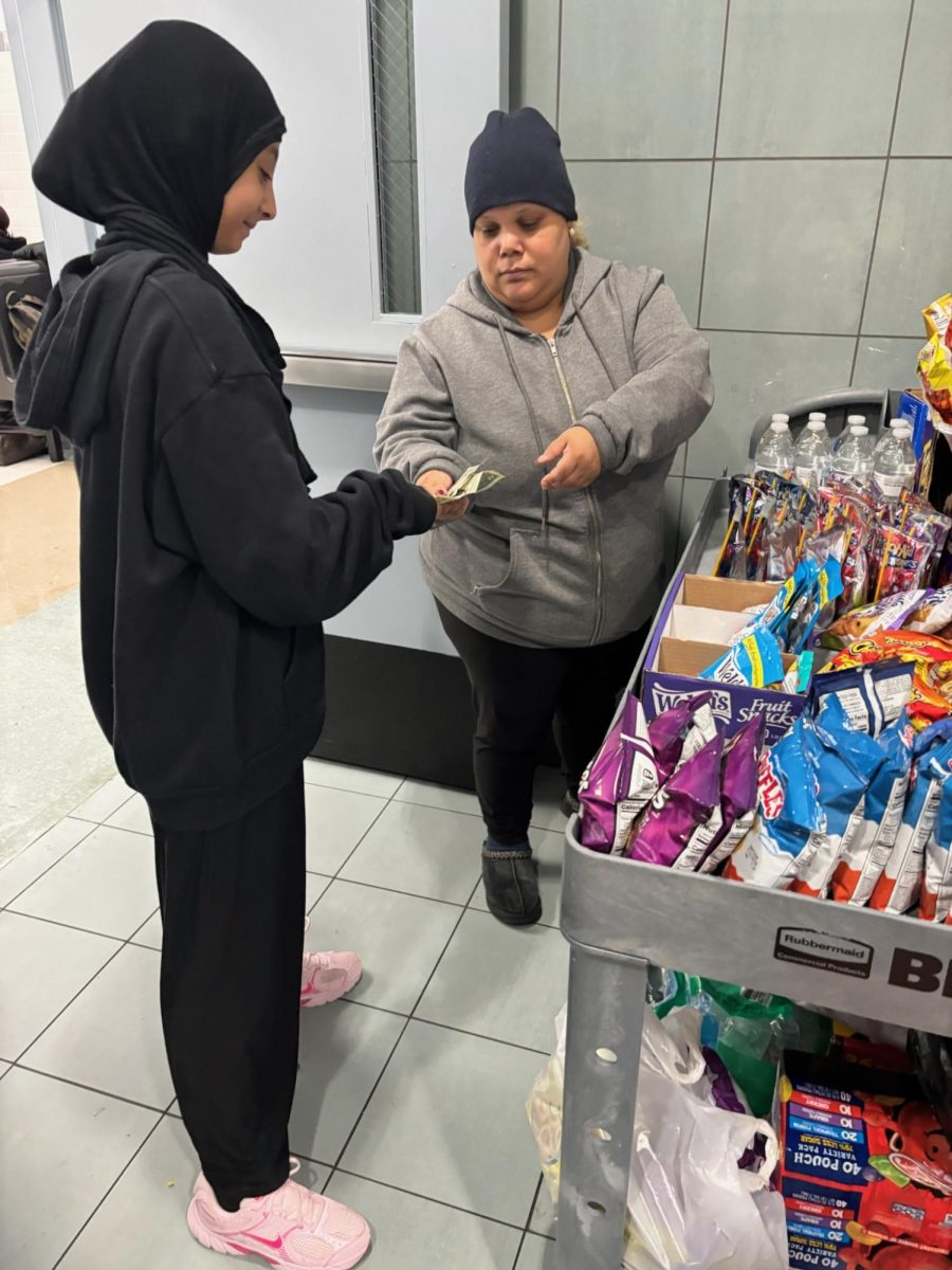 PTA (Maria) serving snacks